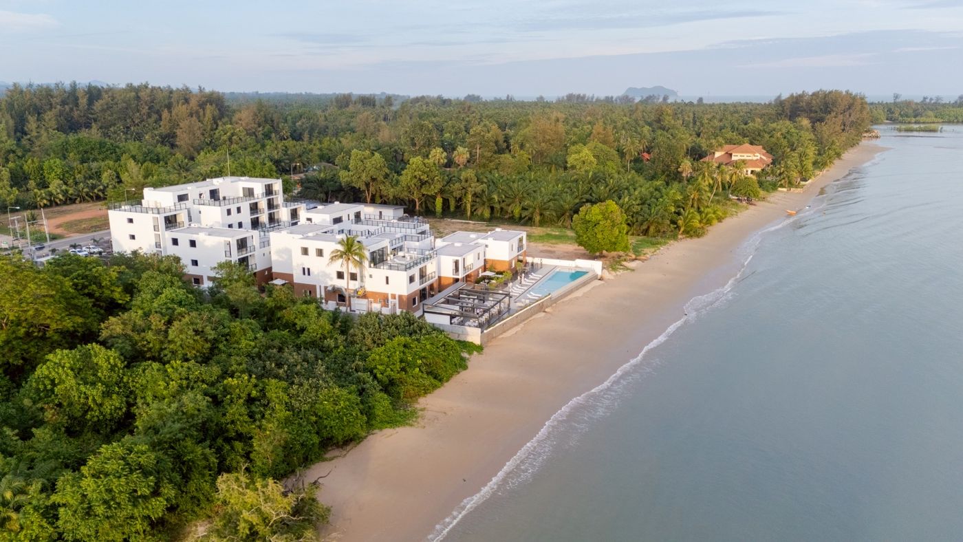 Aerial view of The Village on a quiet stretch of Pathiu coastline